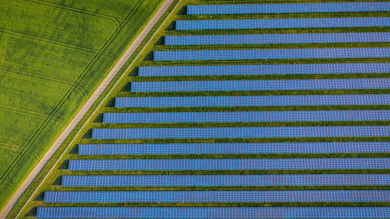 aerial-photo-above-solar-panels-1711847662